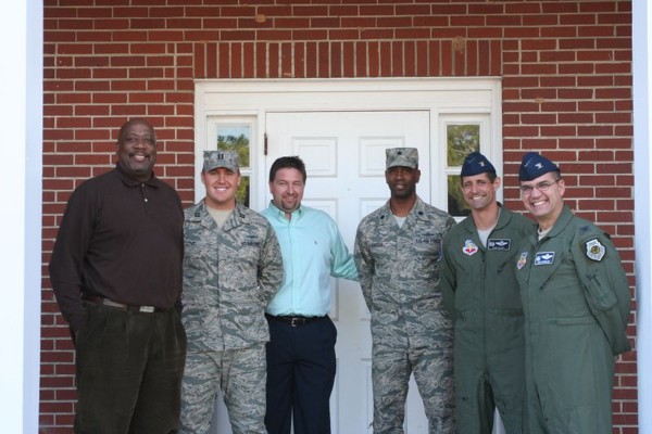In December, chapter members, community leaders and Robins Air Force Base personnel help host a Christmas celebration for orphans from the Methodist Home for Children.